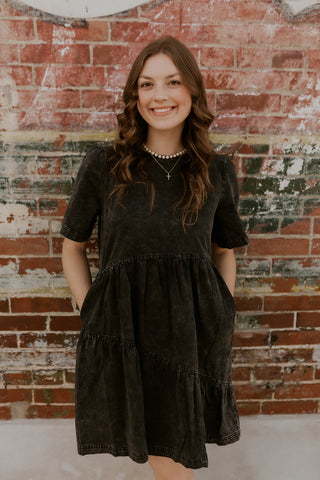 Model wearing Black Mineral Wash Denim Dress.