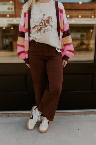 Model wearing chunky striped cardigan and Walker Tummy Control Jeans.