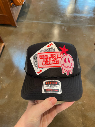 Not Surprised Trucker Hat