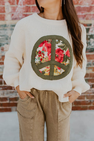 Patched Up Peace Sign Sweater