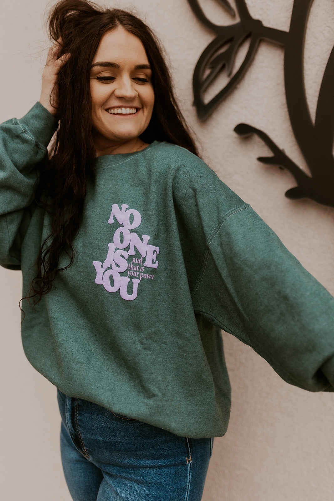 Green Sweatshirt that says No One is You in Purple
